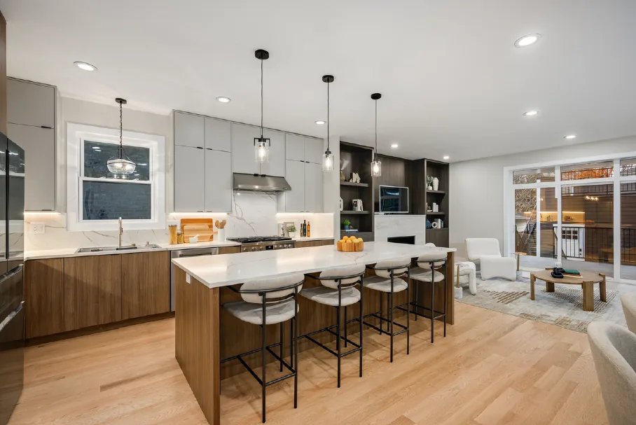 Frameless walnut cabinetry with slim reveals and concealed hardware